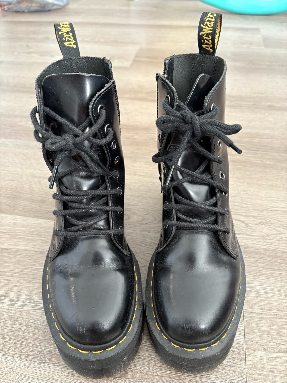 Dr. Martens Black Leather 8-Eye Lace-Up Combat Boots with Yellow Stitching